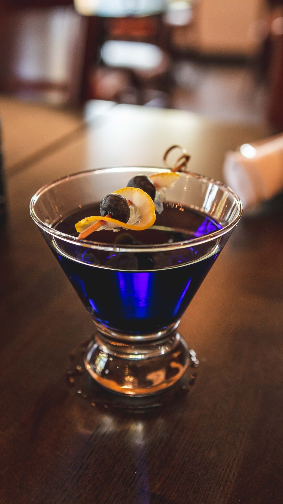 A dark martini with a citrus twist