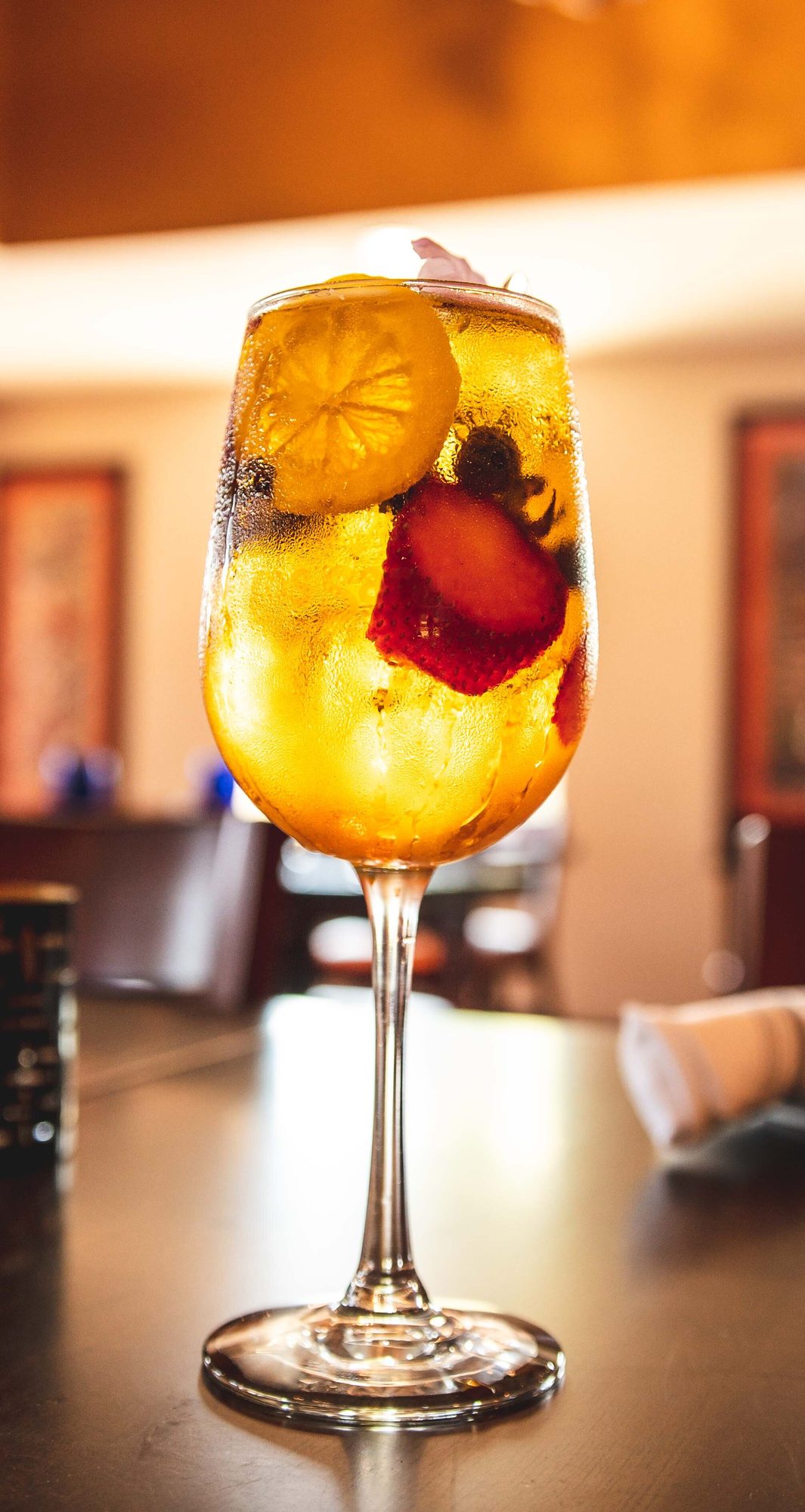 Sangria in a stemmed glass, fruit through it